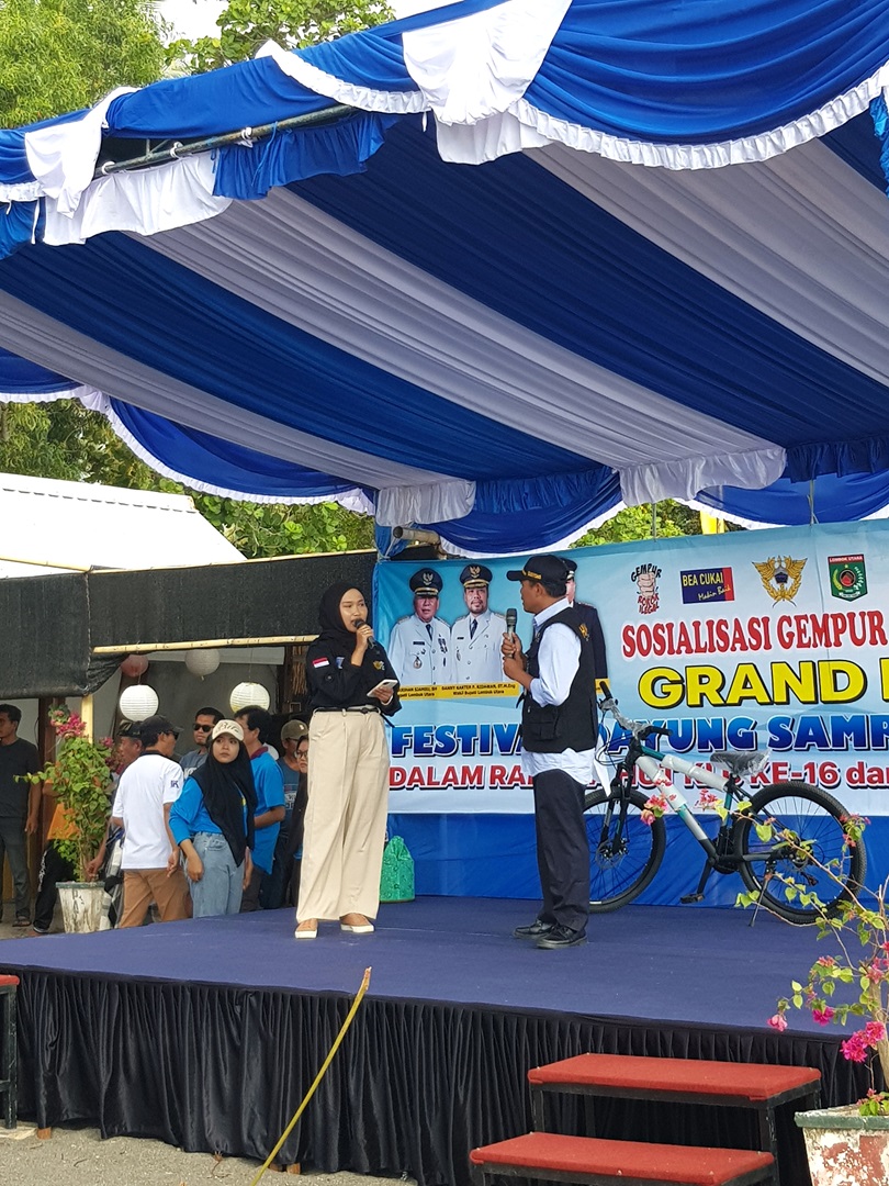 Bea Cukai Mataram Bersama Pemkab Lommbok Utara Sosialisasi Gempur Rokok Ilegal dalam Festival Dayung Sampan
